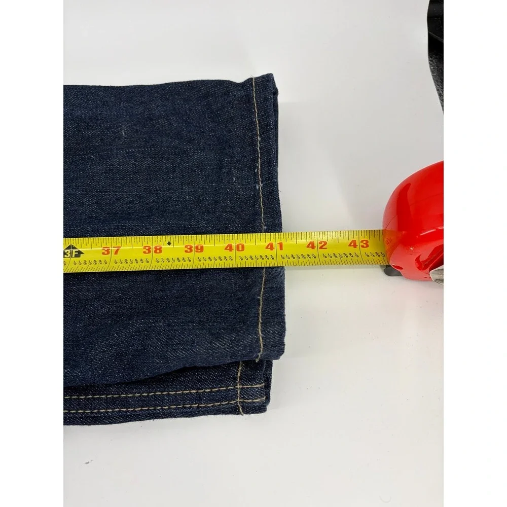 Skool brand jeans, specifically‎ a dark wash, wide-leg baggy style with. Size 42